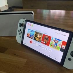 NINTENDO SWITCH OLED + CONTROLLER + 2 GAMES (TODO NUEVO DE CAJA Y NUNCA USADO
