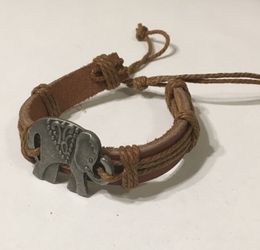 Brown leather bracelet with silver elephant charm
