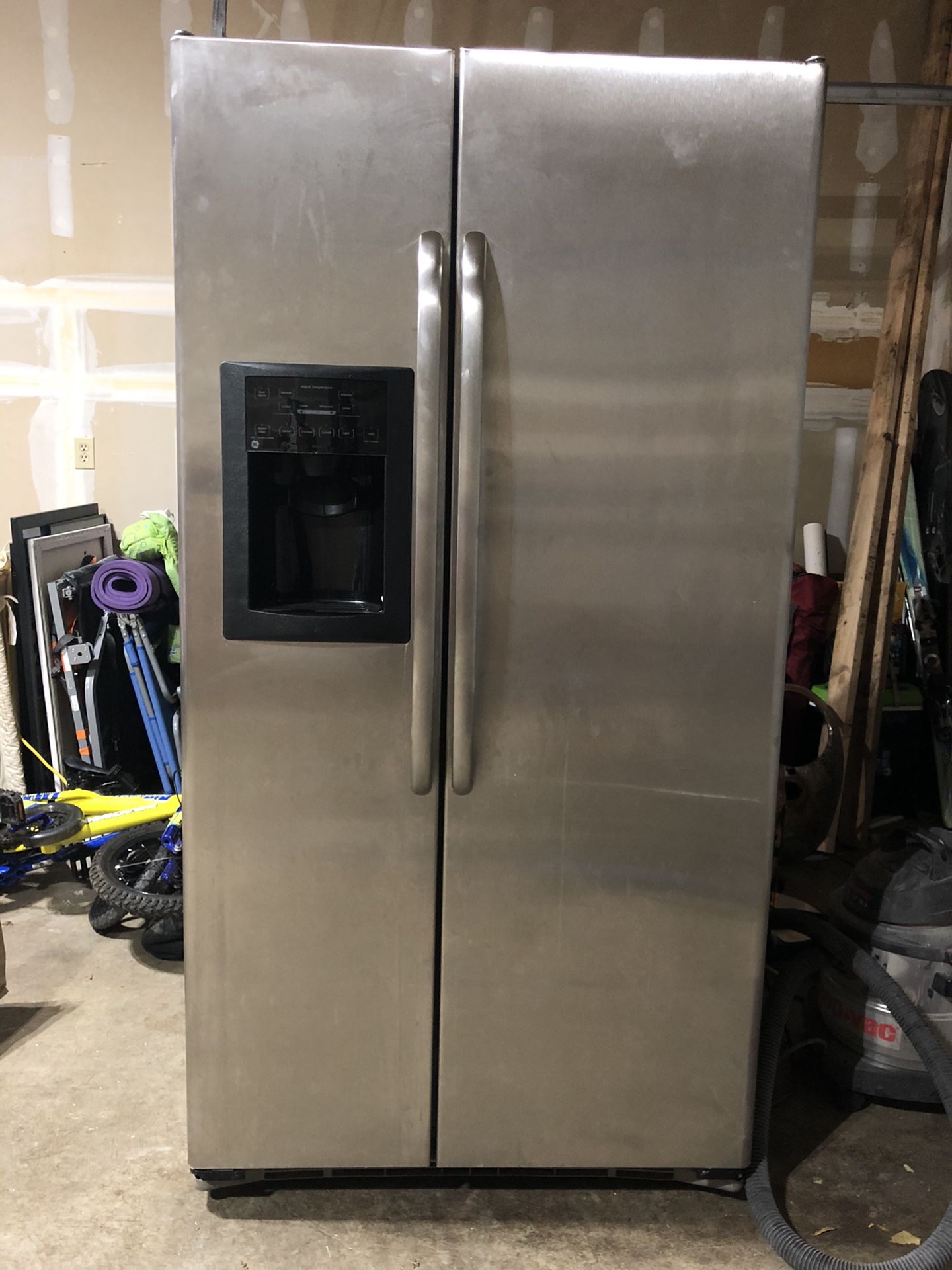 GE stainless steel 25.4 cu ft side-by-side refrigerator with ice maker