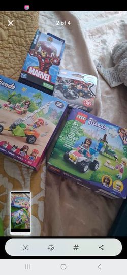 Brand new unopenes Lago bundle set 3 Lego set and a iron man action figure all for $20