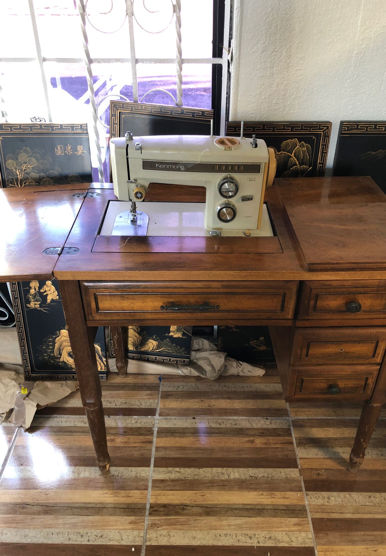 Sewing machine with cabinet