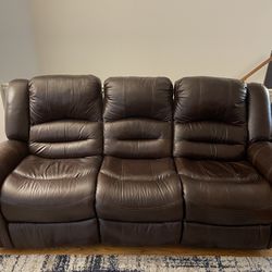 Brown leather Recliner Sofa From Raymour and Flanigan. Excellent Condition