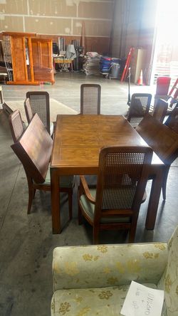 Wood Dining Table with 6 Cane Back Chairs