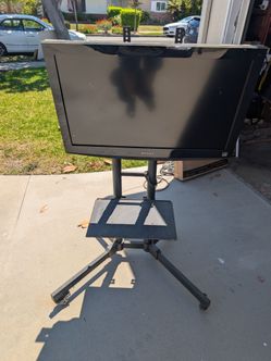 32" Dynex Flat Screen TV on Rolling Stand