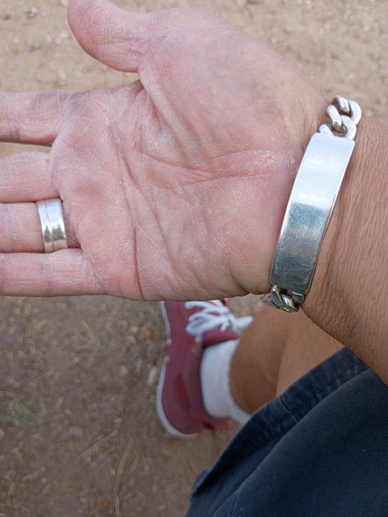 I'm Selling The Bracelet It Weighs 49 G It's Pure Silver And The Ring It's A 57 Piece 7 All Together For 200