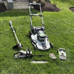 Ego Lawnmower, Weedwhacker, And Chainsaw With A 4ah Battery N Charger