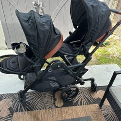 Contour curve double black stroller