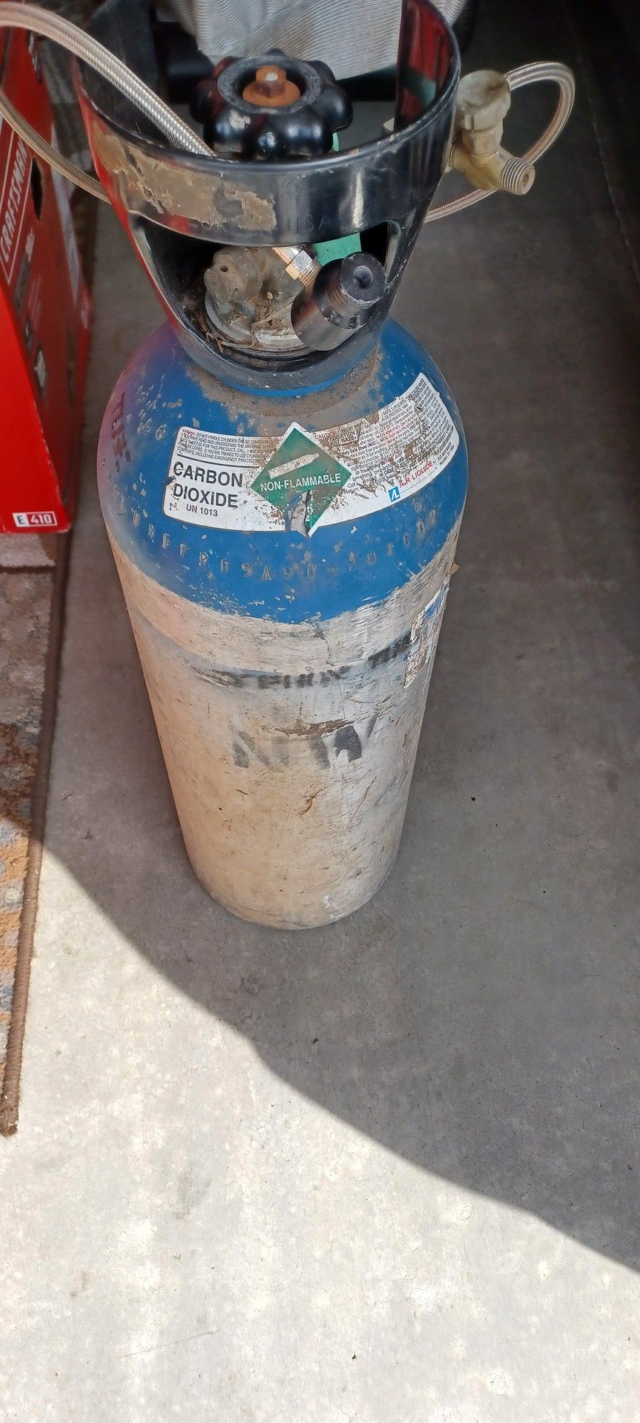 Carbon Dioxide Tank With Hose Partially Full