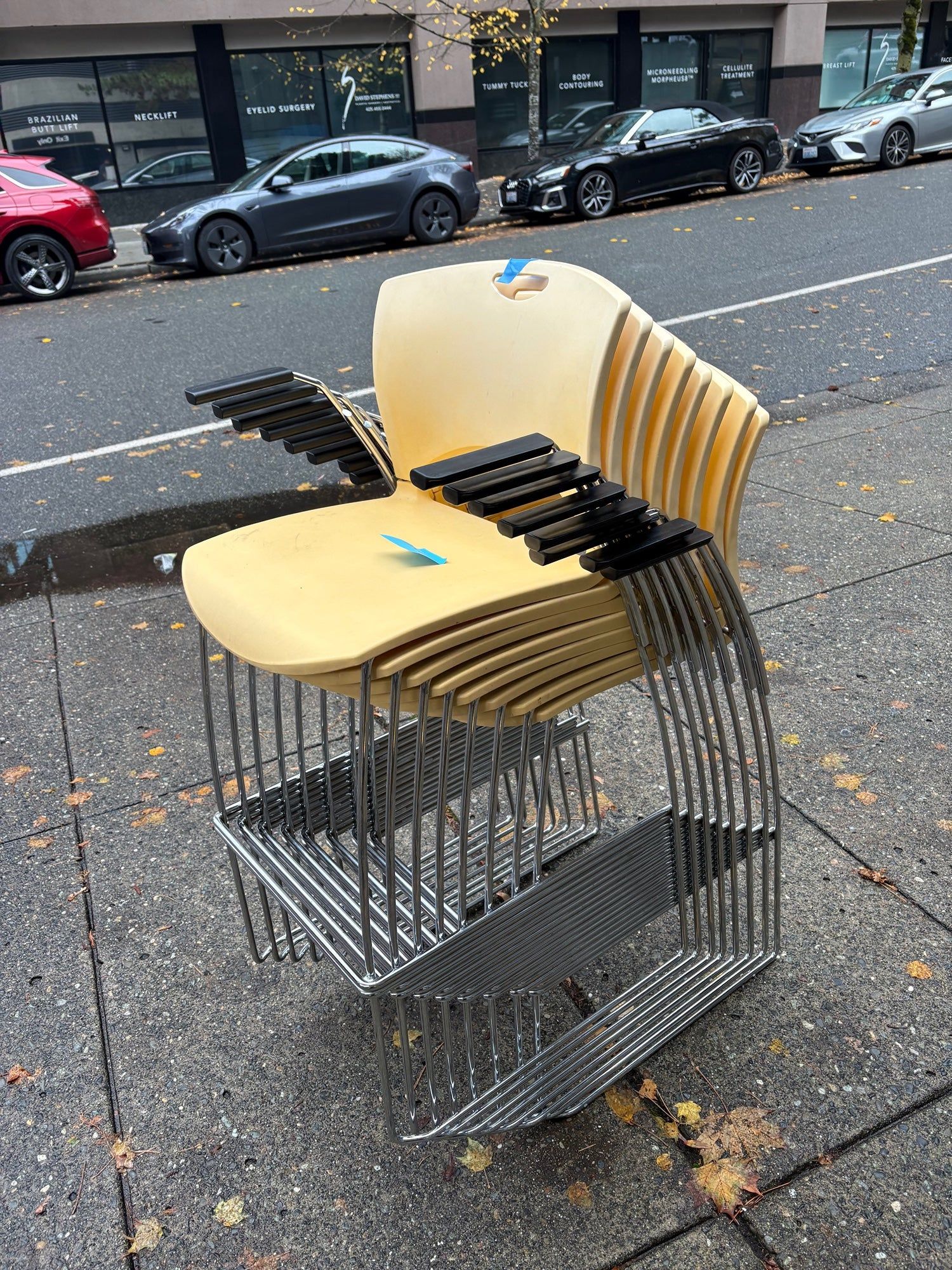 Warehouse sale --- Set of 12 Stackable Yellow Plastic Chairs with Chrome Frames and Armrests
