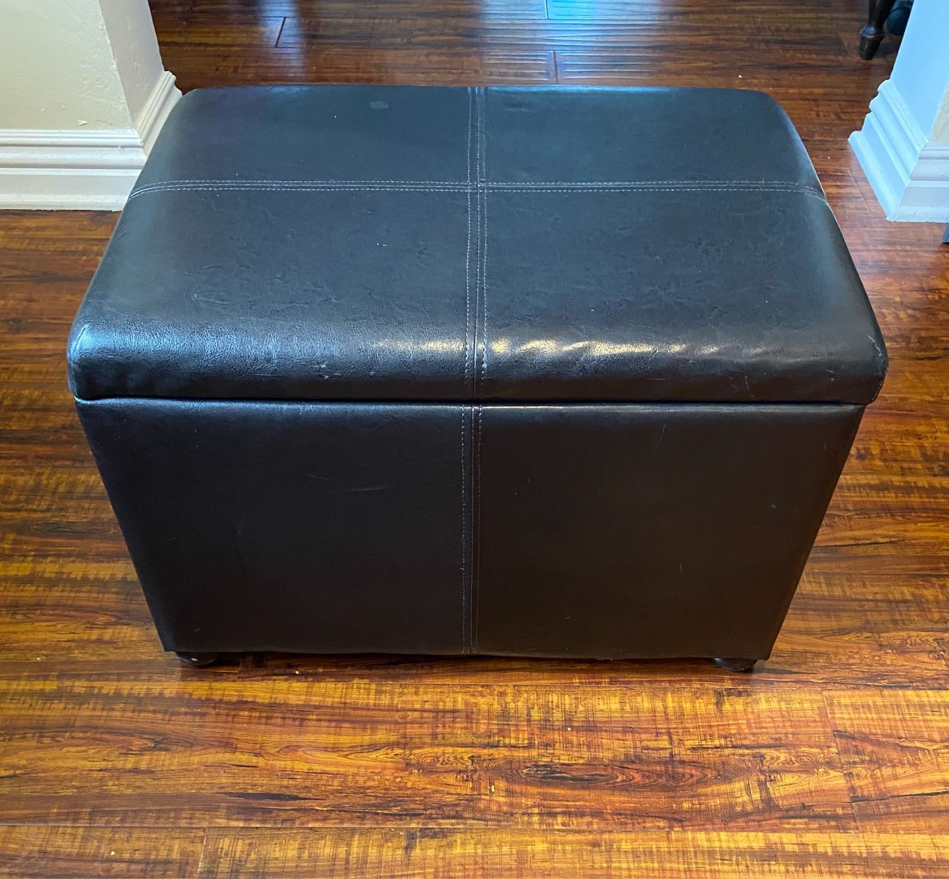 Black bench seat with storage