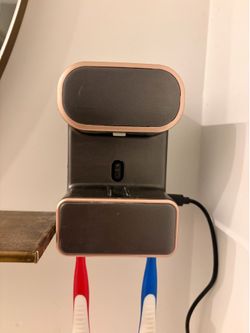 Automatic toothpaste dispenser & brush holder