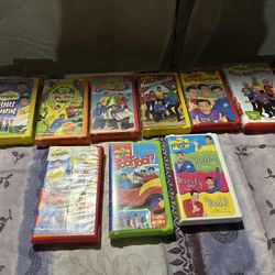 Lot of nine The Wiggles VHS tapes with original cast