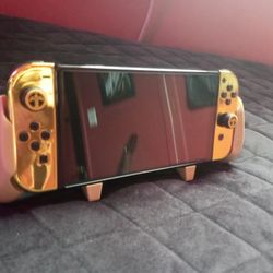 Nintendo Switch OLED With Custom Gold Joycons Bundle