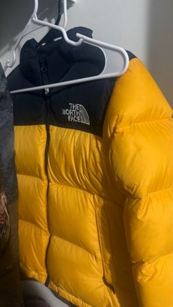 North Face yellow puffer