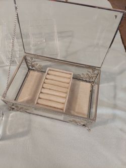 Set of cosmetic bags, new bags, makeup organizer, and a glass jewelry box.