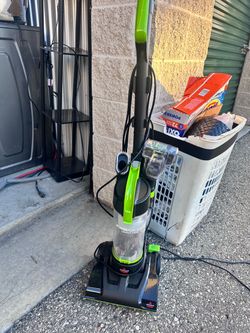 Green bissell vaccum cleaner