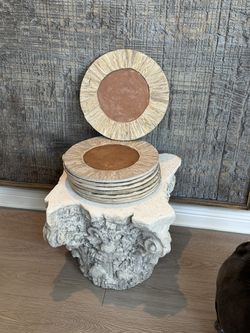 Eight driftwood chargers from Pottery Barn