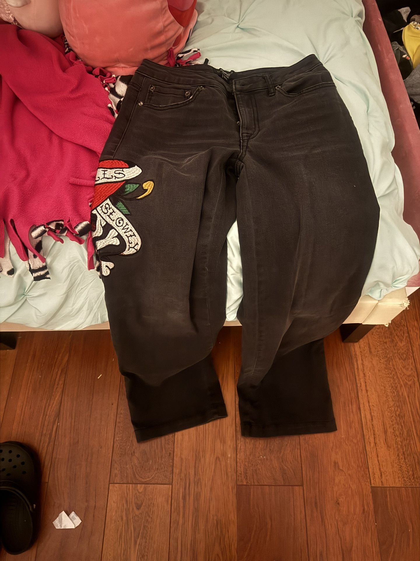 Ed hardy denim pants.