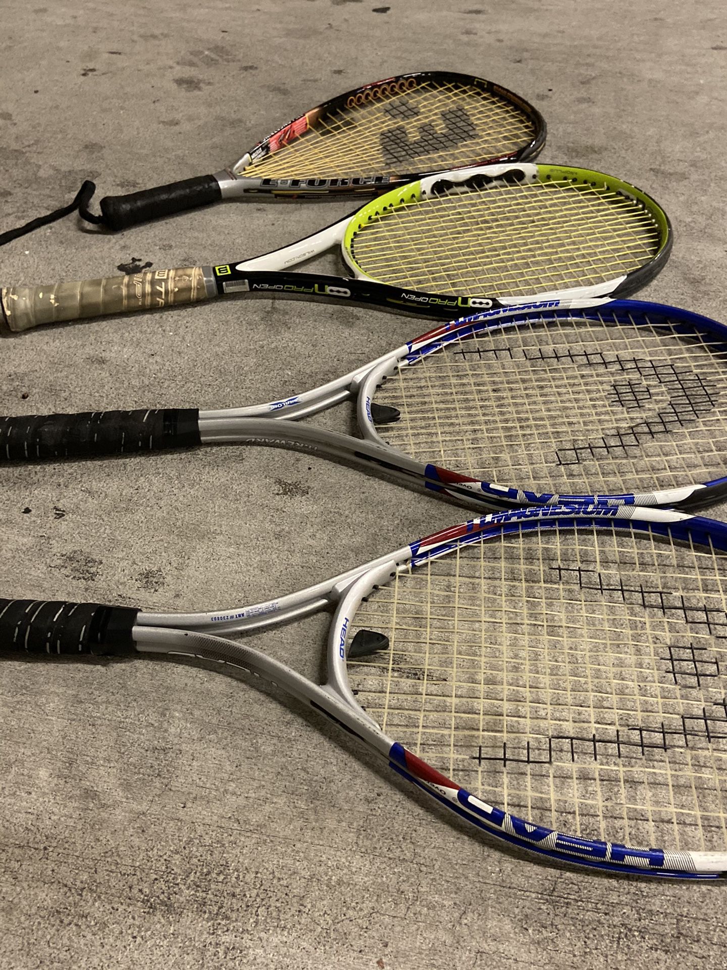 Tennis and racquetball rackets