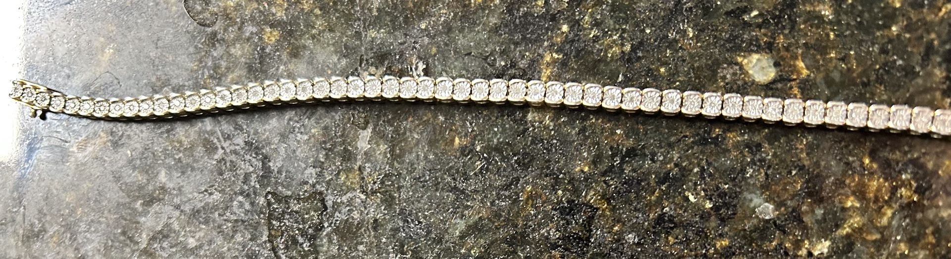 Mesmerizing Diamond/ Yellow Gold Tennis Bracelet
