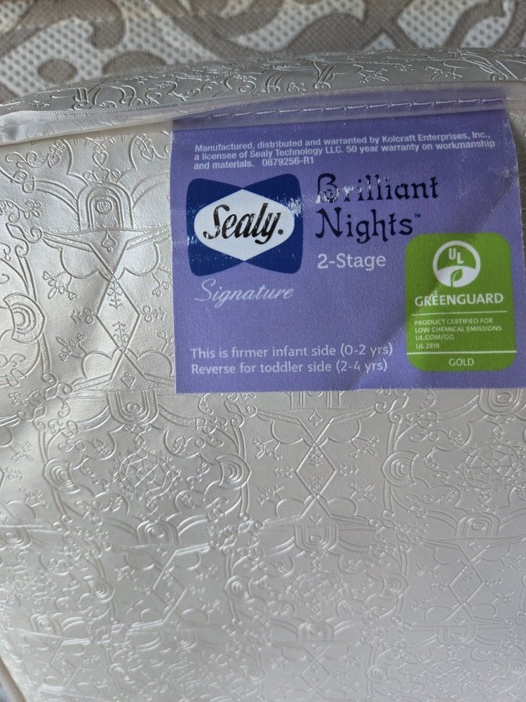 SEALY BABY MATRESS IN OUTSTANDING CONDITION Cover Included