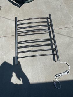 Heated bathroom  towel rack