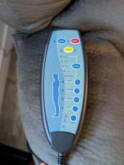 Plush recliner with back massager