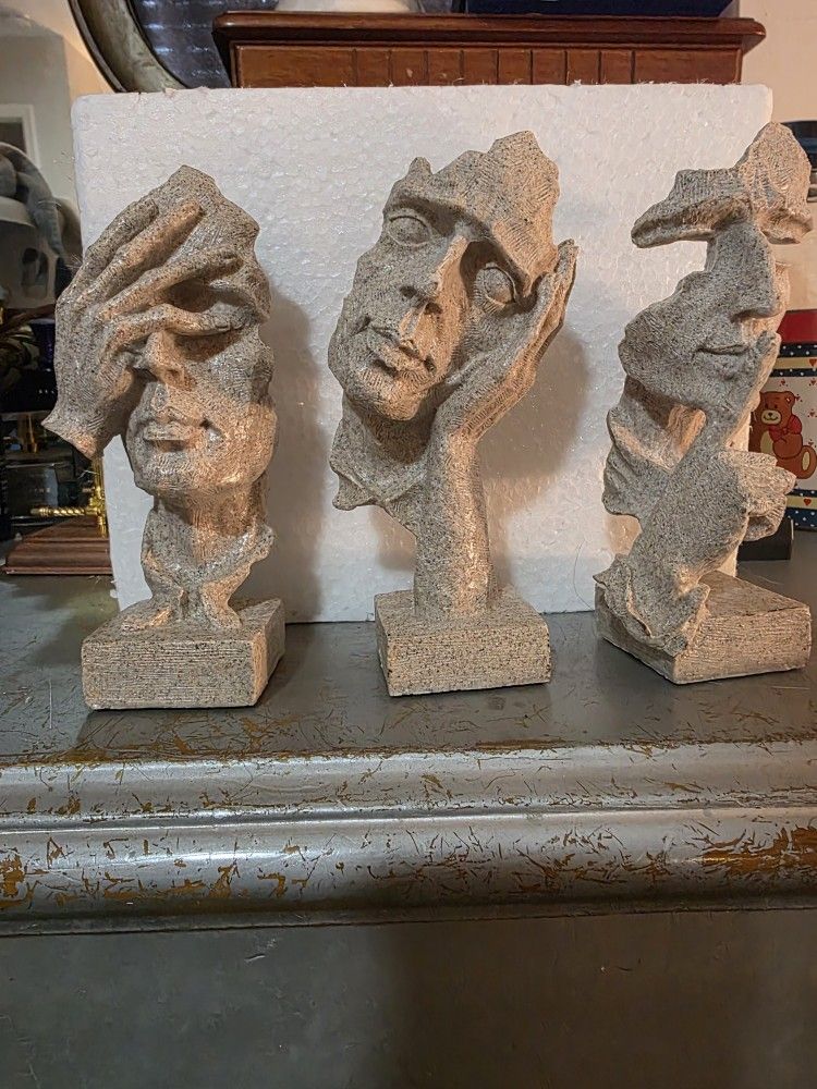 See no evil speak, no evo here, no evo statue