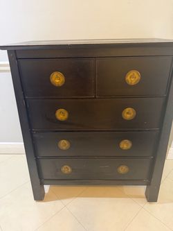 Brown Wood Dresser with Gold Ring Knobs