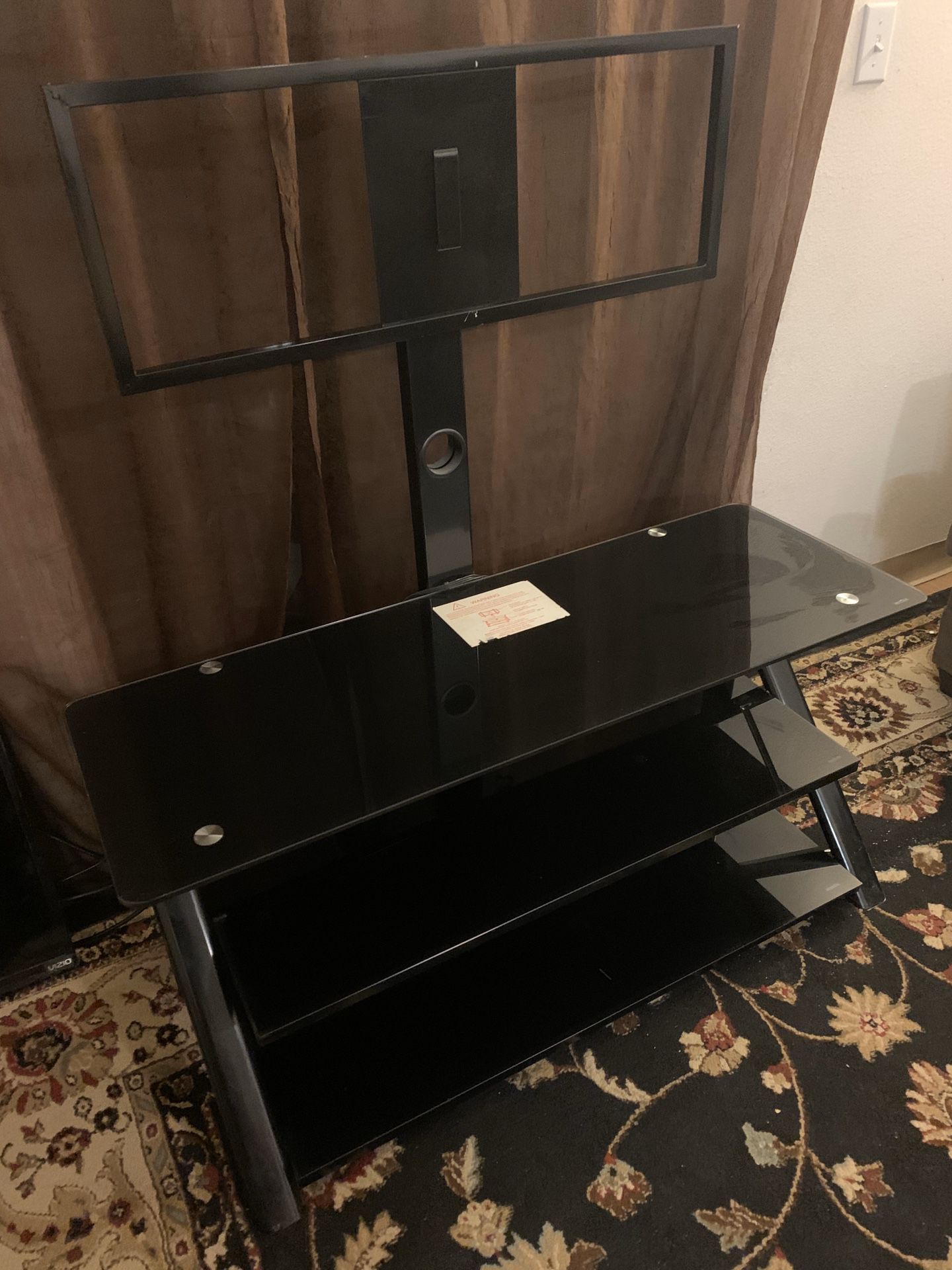 Black TV stand with swivel mount