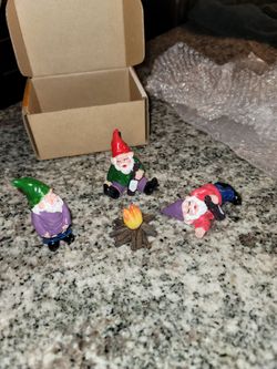 Brand new Collectable RESIN CAMPING DRUNK PEEING GNOMES Sitting Around Bonfire & dozens more items posted here.