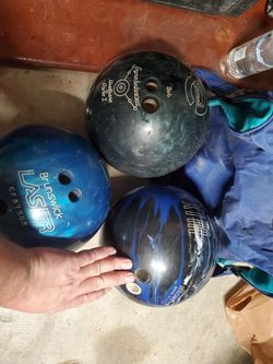 2 ebonite 1 Brunswick bowling balls