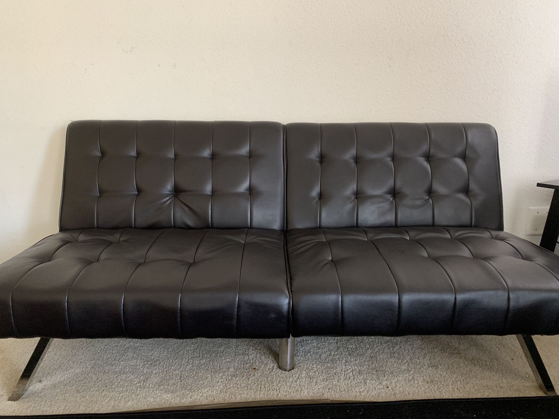 Dark brown faux leather sofa cum bed