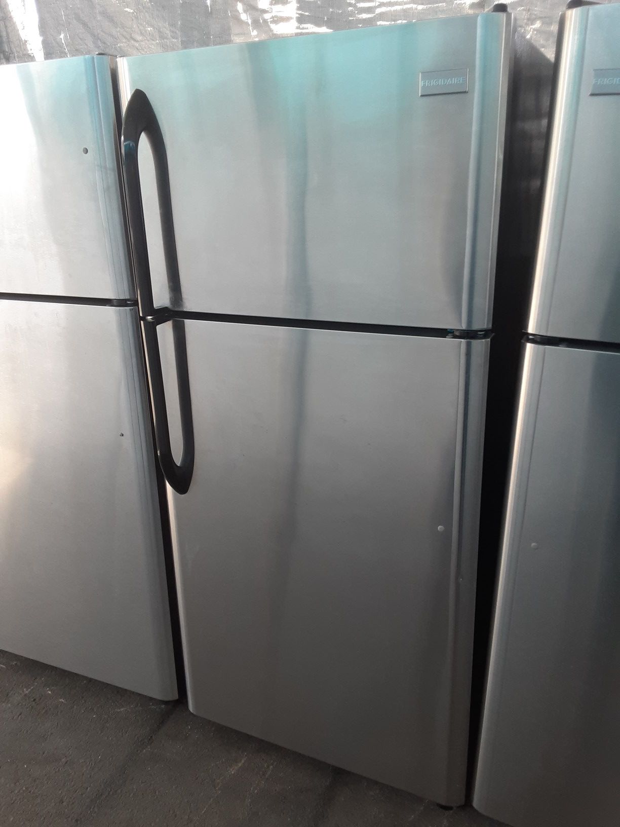 $350 Frigidaire stainless 18 cubic fridge apartment-size includes delivering the San Fernando Valley a warranty and installation