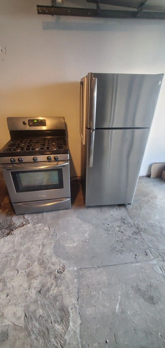 STOVE and fridge..28.inches fridge 30 stove great condition. $850. both item ...free delivery