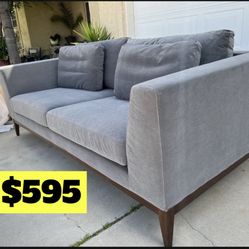 Brand New. Mid Century Modern Sofa. Charcoal Grey/light Walnut Base And Legs. 2 Available. $595 Each