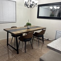 Dinner Table And Chairs In Great Condition. New!