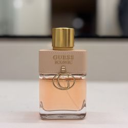 Guess Iconic, 3.4oz. (full size) level as shown a floral woody musk fragrance for women.