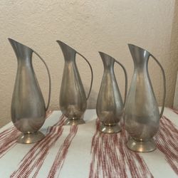 Four 1960’s Pewter ware pitchers 