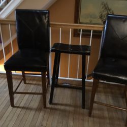 Two Beautiful  Black  Leather  Hight Chairs, Also A Hight Stool For The Bar Or Where Ever You want To Put Them