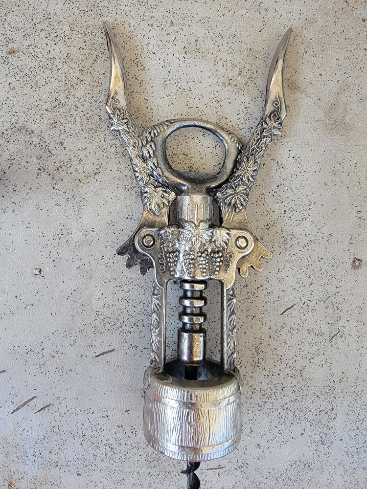 ANTIQUE CORKSCREW GRAPES DESIGN. RARE BOTTLE OPENER MADE IN ITALY