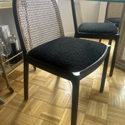 CB2 Black Rattan Dining chairs