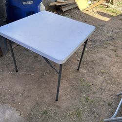 Folding Table And Chairs 