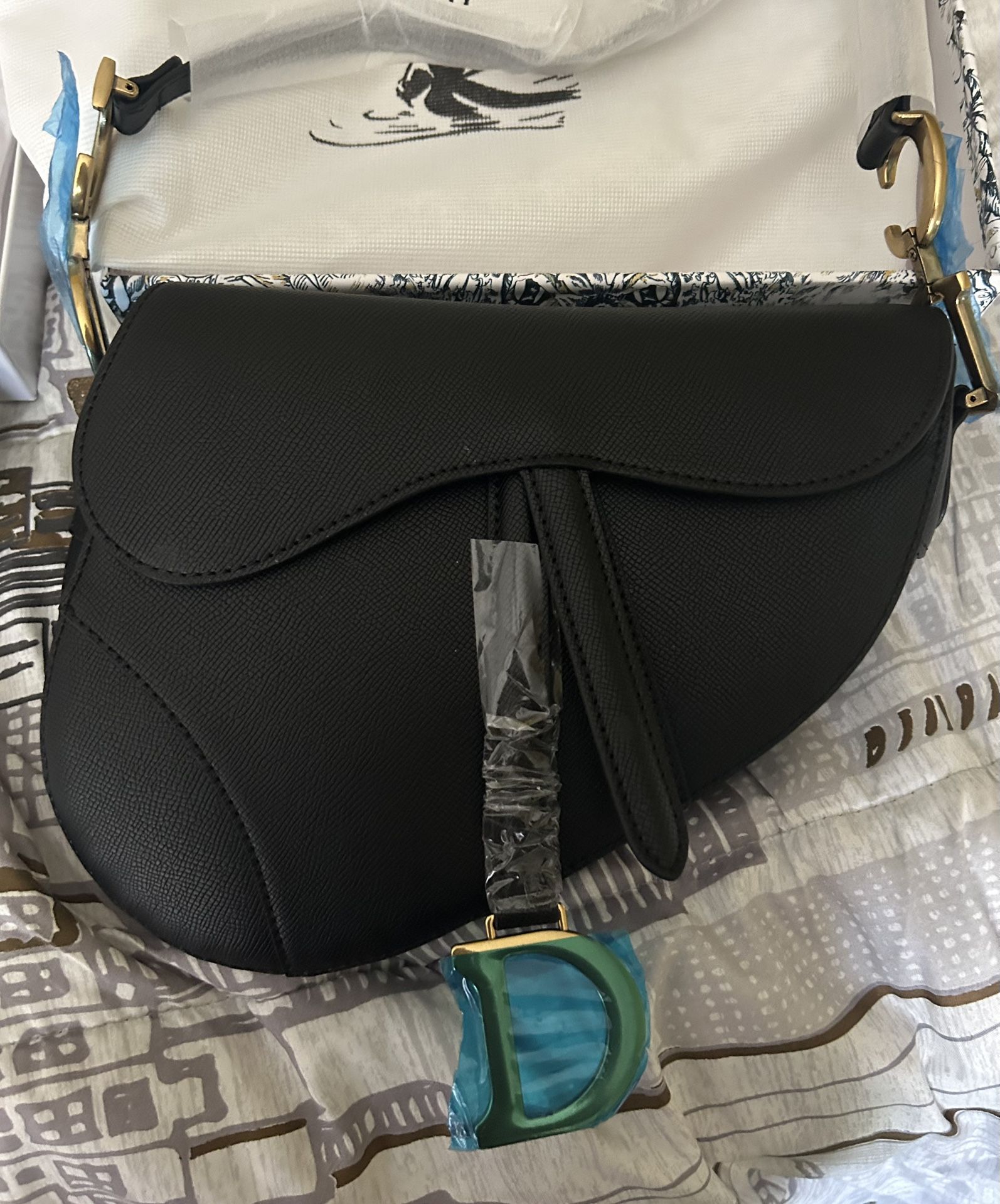 Brand new Saddle bag with matching Wallet