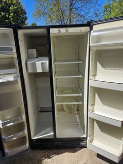 Black Whirlpool side by side refrigerator