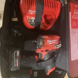 Milwaukee 12v 3/8” drive stubby impact wrench with(2)  batt and charger new $275  firm in n Lakeland 