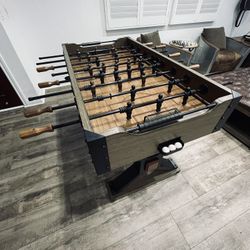 Foosball Table, Complete with 3 balls, in Excellent Used Condition.  Price is Firm.
