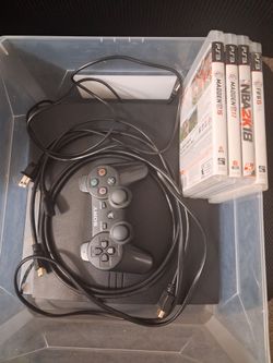 Ps3 slim 160GB with 1 controller and 4 games perfect working condition comes with all cords and 4 games