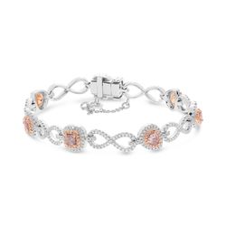 Natural Pink Diamond Bracelet in 18K White and Rose Gold 18K White and Rose Gold Halo Natural Pink Diamond Bracelet featuring 7 natural Pink Diamonds 