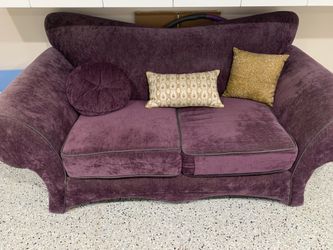 Purple wing-back couch